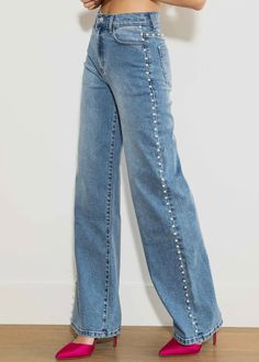 high-rise wide-leg jeans featuring wide pearl stud detail, a 5-Pocket construction and zip-fly closure. Rise: 12", Inseam: 33" Model is 5'7" and wearing a size 3 (wearing heels) these are for my tall girls! runs true to size. Personally, I typically wear a small/ 26 or a 6 in athletic clothing.I wear a size 5 in these jeans! I’m 5.6” and they are perfect with a small heel or a taller heel boot! Fabric: 99% Cotton, 1% Spandex (Some stretch) Pearls are “punched” through! Similar concept to a nut a High Rise Wide Leg Jeans, Studded Jeans, Jean Large, Stylish Jeans, Embellished Jeans, Wide Jeans, Medium Wash Jeans, Perfect Jeans, Wide Leg Denim