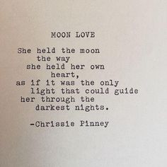 a poem written in black ink on white paper with the words moon love and she held the moon above her head