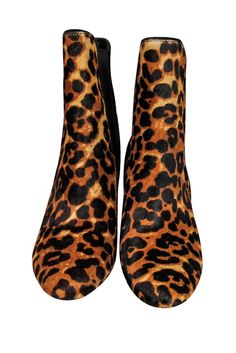 Go wild in these leopard heeled booties from Lauren Ralph Lauren! Made with a calf hair upper, these are the perfect shoes to pair with some black skinny jeans, or even a Little Black Dress, to let everyone know that you mean business! Wear something as unique as you are. Size 8 Printed calf hair upper Elasticized sides for slip-on style Almond shaped toe Thin, stacked wooden heel Leather interior with no wear Leather and man-made soles with no wear Heel 3" Leopard Heels, Business Wear, Go Wild, Wooden Heel, Calf Hair, Perfect Shoes, Black Skinnies, Lauren Ralph Lauren, Almond