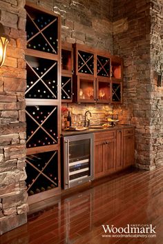 a wine rack in the corner of a kitchen