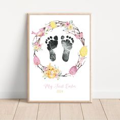 a baby's hand and foot print with the words, my first easter