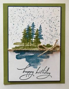 a handmade birthday card with watercolor trees