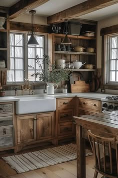 a kitchen with wooden cabinets and white counter tops is pictured in this image, there are two windows above the sink