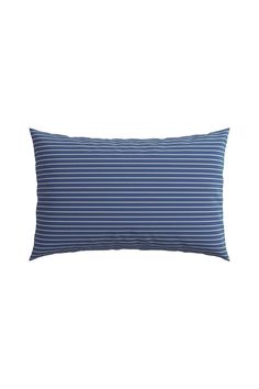 a blue and white striped pillow on a white background