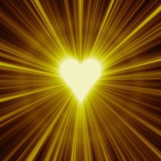 a heart shaped object is shown in the middle of yellow light rays with black and white background