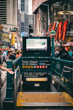 the back of a bus with people walking on it in new york city, ny