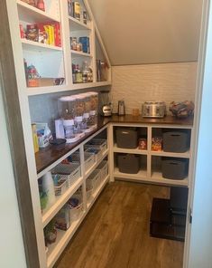 a pantry with lots of food and containers in it