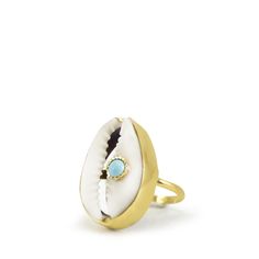 A reminder that sunny days are on the horizon, this ring is carefully handcrafted from 18k gold over silver featuring a cowry marked with a turquoise bead. Style it with its matching layered necklace from the Marina collection. Handmade from 18-karat Yellow Gold Over Sterling Silver (1 micron plating). We suggest to avoid contacts with soaps, detergents, chlorine and any other chemical substance that could alter the original characteristics of your jewel. When it is not worn, keep your jewelry p Unique Gold Jewelry For Vacation, Handmade Oval Jewelry For Beach, Unique Gemstone Jewelry For The Beach, Handmade Open Ring Jewelry For Beach, Unique Turquoise Jewelry For Vacation, Handmade Gold Rings For Beach, Handmade Gold Rings For The Beach, Blue Topaz Bracelet, Chunky Jewelry