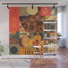 a room with a chair, table and wall mural on the wall that says vable