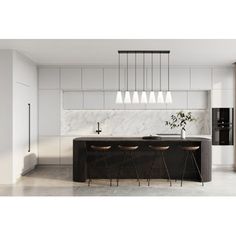 a kitchen with marble counter tops and bar stools