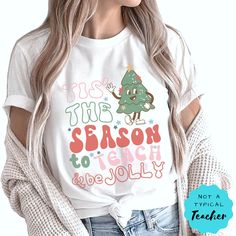 This Special Education Teacher Christmas shirt is the perfect way to start the Christmas season. Your students will love seeing you wear a shirt they can relate to. This Pecs tee is the perfect gift for BCBA, RBT, or Speech therapist. This is such a comfy, soft Tee with a loose fit, perfect to go with your favorite leggings. Special Education Teachers~Check out my pecs shirts here.... https://www.etsy.com/shop/NotaTypicalTeacher?ref=simple-shop-header-name&listing_id=1210561520§ion_id=37649440 S Teacher Tshirt Winter, White Graphic Print Shirt For Holiday, Pre-shrunk White Christmas Shirt, Holiday Cotton Graphic Tee Shirt, Cotton Graphic Tee Shirt For Holidays, Christmas Shirts For Teachers, Vinyl Templates, Shirts For Teachers, Favorite Leggings