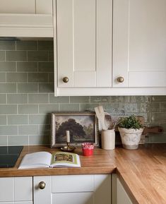 the kitchen counter is clean and ready to be used as a cook's table