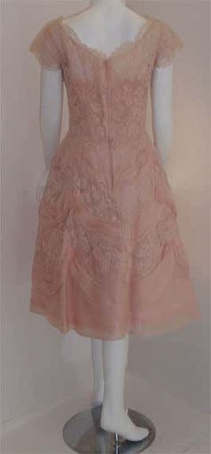 For Sale on 1stDibs - This is a collectible pink lace vintage cocktail dress by Ceil Chapman, from the 1950's. The dress has a scoop neckline, full skirt, cap sleeve, and a Light Pink Lace Dress, Ceil Chapman, Vintage Cocktail Dress, Lace Cocktail Dress, Cocktail Dress Vintage, Lace Vintage, 1950s Style, Vintage Cocktail, Cocktail Dress Lace