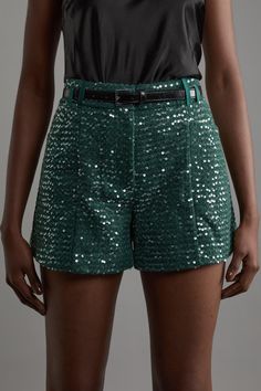 Turn Heads In Our Shorts, Made With Tweed Fabric, Accented With Sparkling Sequins. The Fit Skims The Curves, While The High Waistline Ensures Optimal Comfort. Styles Well With A Shirt And Strappy Heels Or Pointed Toe Shoes For A Statement Occasion Look, Perfect For Parties And Date Nights. Tailored Sequin Tweed Shorts High Quality Tweed Fabric With Sequin Details Comfortable, High Waistline Double Belt Loop Detailing Flattering Straight Leg Silhouette Summer Sequined Green Bottoms, Green Sequined Summer Bottoms, Summer Green Sequined Bottoms, Party Bottoms With Belt Loops And Short Cut, Green Short Bottoms For Fall, Green Short Fall Bottoms, Fitted Green Shorts For Fall, Green Sequined Bottoms For Spring, Spring Green Sequined Bottoms