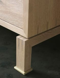 a close up of a wooden dresser drawer