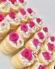 there are many small cakes with flowers on them