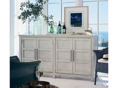 a living room scene with focus on the sideboard