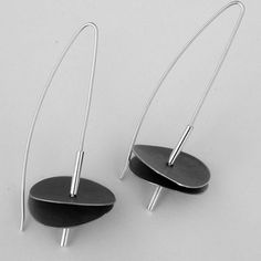 Silver Earrings - These beautifully hand-oxidized silver earrings are incredibly lightweight. They are adorned with a contrasting bright silver wire. Contemporary Earrings With Oxidized Finish, Contemporary Earrings With Oxidized Finish As Gift, Contemporary Oxidized Finish Earrings For Gift, Contemporary Oxidized Finish Earrings, Contemporary Silver Earrings With Oxidized Finish, Handmade Black Contemporary Earrings, Contemporary Oxidized Metal Earrings, Contemporary Handmade Black Earrings, Minimalist Metal Earrings With Oxidized Finish