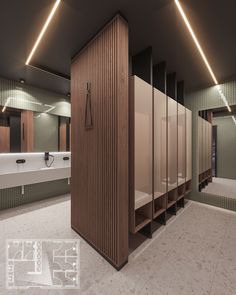 a bathroom with several stalls and sinks in the middle, all made out of wood