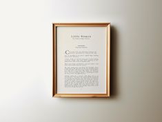 a framed book page with the poem little wonder on it's front and back