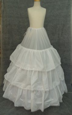 "Vintage, NEW WITH TAGS, NEVER BEEN WORN! Beautiful hoops! One size fits all! Waist pull string! white color! Length from wait to hem: 40.5\" waist is adjustable with pulling cord. Crinoline with 4 hoops, and it has ruffled tiers over the hoops to hide them; tiers have lace edging, it is a very beautiful hoop with great workmanship and first quality nylon fabric material. This is a great Crinoline for a ballgown, or any dress with a big skirt that needs lift and body. This is a practical option Puffy White Skirt Outfit, White Costume Skirt With Attached Cancan, White Cotton Wedding Skirt, Cotton Tiered Skirt For Wedding, Cotton Tiered Wedding Skirt, Underskirt Dress, Junk Couture, Cancan Skirt, Big Skirt