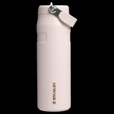 thermos water bottle is pink and has a white lid with a black handle