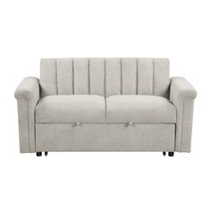 a light gray couch sitting on top of a white floor