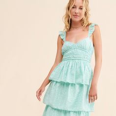 Myrtle Tiered Dress | Nuuly Rent Lined Tiered Dress For Brunch, Tiered Lined Dresses For Brunch, Fitted Tiered Sundress For Garden Party, Spring Tiered Skirt Midi Dress, Spring Midi Dress With Tiered Skirt For Casual Wear, Fitted Tiered Sundress Midi Dress, Tiered Skirt Midi Dress For Brunch, Green Tiered Sundress, Green Tiered Skirt Sundress