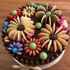 a chocolate cake decorated with colorful candies