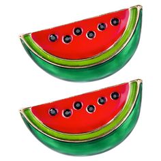 two slices of watermelon with black dots on the bottom and green sides, sitting next to each other