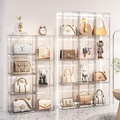 a display case filled with lots of purses and handbags next to a table