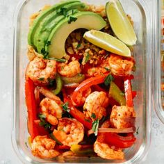 two plastic containers filled with shrimp, peppers, and avocado on top of a table