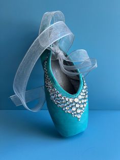 These one-of-a-kind rhinestoned pointe shoes are a perfect gift for a ballerina, former dancer, or ballet lover! As a professional ballet dancer myself, I love designing dance memorabilia to celebrate the art form.  Shoe is hand dyed, painted, and stoned with care. Each shoe takes many hours of work to complete.  Shoe length approximately 9 inches Shoes are brand new - not previously worn!  ** Shoe is NOT meant to be worn! Bedazzled Pointe Shoes, Pointe Shoes Painting, Colored Pointe Shoes, Point Shoe, Ballet Decor, Turquoise Shoes, Ballerina Gift, Ballet Pointe Shoes, Womens Costume