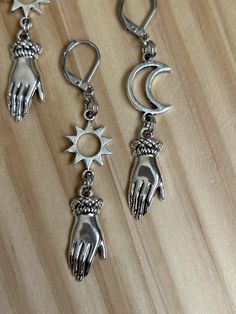 90s celestial inspired dangle earrings, one sun and one moon earring per pair!  Handmade in Indiana, USA. Earrings Sun And Moon, 90s Celestial, Whimsigoth Aesthetic, Sun And Moon Earrings, Moon Earring, Celestial Earrings, Aesthetic 90s, Moon Earrings, Sun And Moon