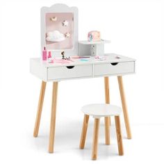 a white desk with a mirror, stool and other items on it in front of a white background