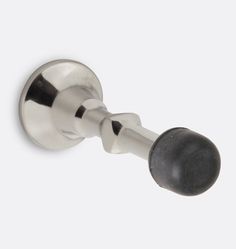 an image of a door handle with black knobs and chrome finish on white background