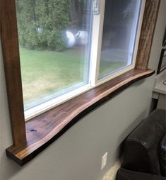 a window sill that has some wood on it