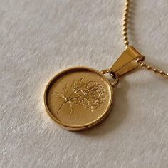 Made in Canada A beautiful gold coin necklace is perfect for stacking and summer. 2 choices of engraving. The sun represents life, positivity, and clarity or the Fleur De Pivione Necklace Aka, the Peony. Chain Length: 18 inches plus a 2-inch extension included. Pendant Size: 15mm💦 Water Resistant & Anti Tarnish Pictured with: Sun Coin Necklace Cheap Gold Necklace With Coin Pendant, Affordable Gold Jewelry With Coin Pendant, Luxury Gold Plated Engraved Coin Necklace, Luxury Elegant Engraved Coin Necklace, Cheap Dainty Coin Pendant Jewelry, Cheap Engraved Coin Necklace, Introverted Extrovert, Birthstone Charm Necklace, Extroverted Introvert