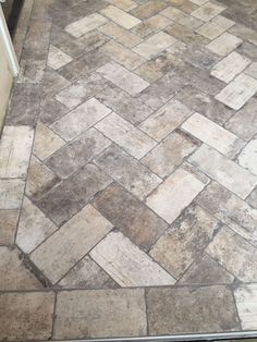 a tile floor that has been cleaned and sealed