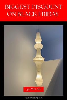 a white light hanging from the ceiling with text reading biggest discount on black friday get 20 % off