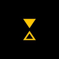 a yellow triangle on a black background with the letter x in it's center