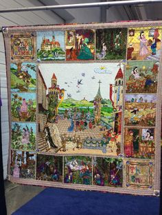 a quilt made to look like the wizard's castle is hanging on a wall