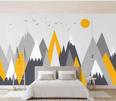 a bedroom with mountains and birds painted on the wall