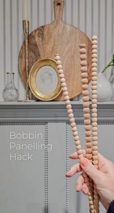 The hottest design trend for 2024, this DIY wood bobbin trim for your board and batten will change the game! It's such a fun and darling addition to your wall paneling and it's perfect for a bedroom, playroom or entryway. You can even add them to dressers and cabinets! Pole Wrap Molding, Bobbin Moulding Wardrobe, Bobbin Bead Moulding, Beaded Trim Ideas, Bobbin Trim Panelling, Bobbin Molding, Bobbin Panelling, Bobbin Trim, Bobbin Furniture