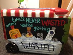 a suitcase that has been decorated to look like a wagon