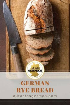 a loaf of bread sitting on top of a cutting board next to a knife