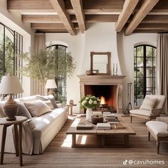 a living room filled with furniture and a fire place in the middle of a room