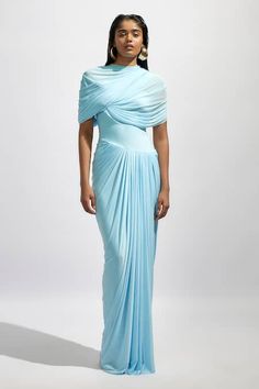 Buy Blue Net Solid High Neck Draped And Pleated Maxi Dress For Women by Deme by Gabriella Online at Aza Fashions. Pre-draped Maxi Dress With Folds, Pre-draped Ruched Floor-length Maxi Dress, Fitted Pre-draped Evening Dress With Cape Sleeves, Pre-draped Evening Dress With Ruched Bodice, Pre-draped Maxi Evening Dress For Banquet, Pre-draped Cocktail Evening Dress With Folds, Fitted Pleated Pre-draped Evening Dress, Blue Maxi Dress With Cape Sleeves For Evening, Pre-draped Pleated Dress For Gala