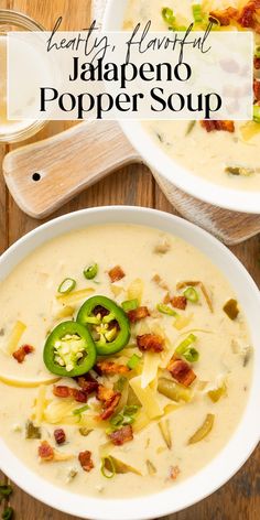 two bowls filled with soup on top of a wooden table