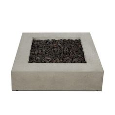 a square concrete fire pit with gravel in the center and rocks around it on an isolated white background